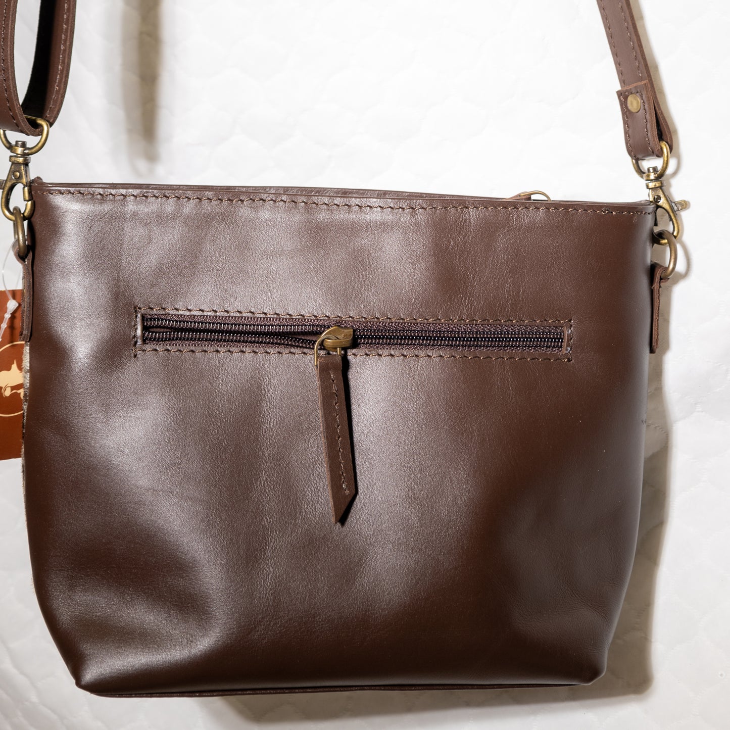 #194 CROSS BODY COWHIDE FRONT/W TOOLED TEAL STRAP/ LEATHER BACK