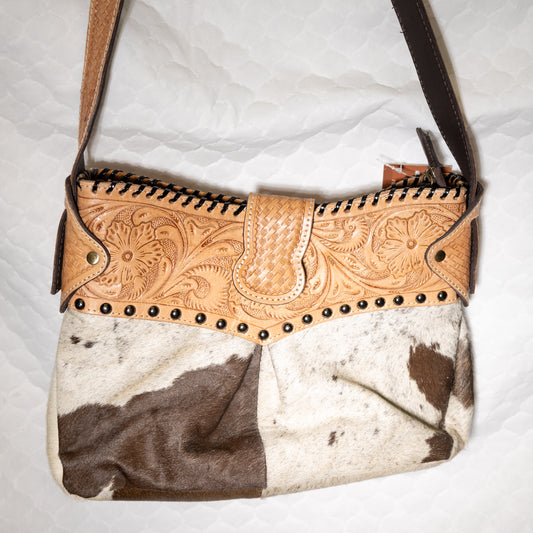 #83  CROSS BODY COWHIDE BODY/ TOOLED TOP/ BUTTONS/ LACED EDGE