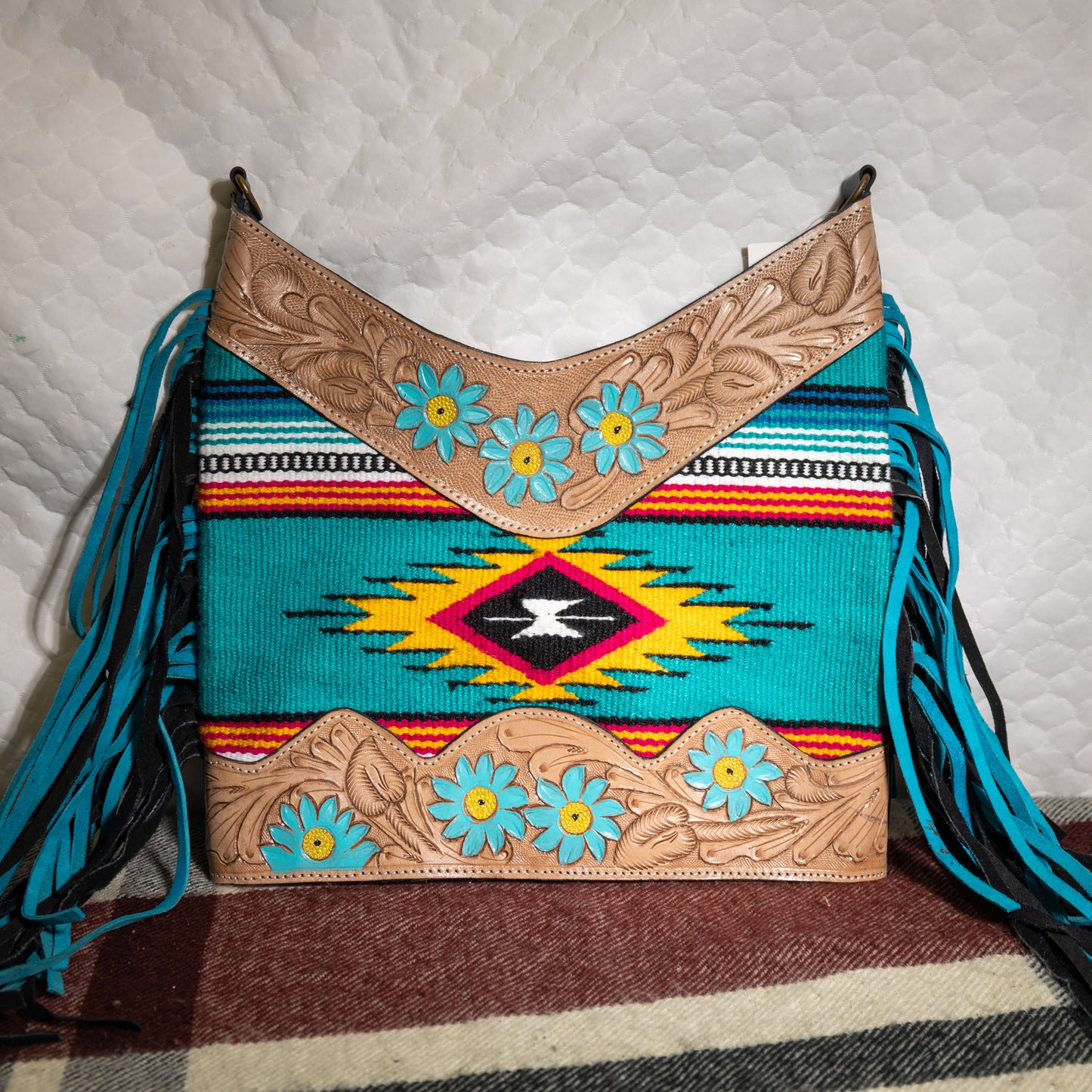 #189 CROSS BODY TOOLED TOP AND BOTTOMW/ TEAL FLOWERS/ FABRIC FRONT/LEATHER BACK