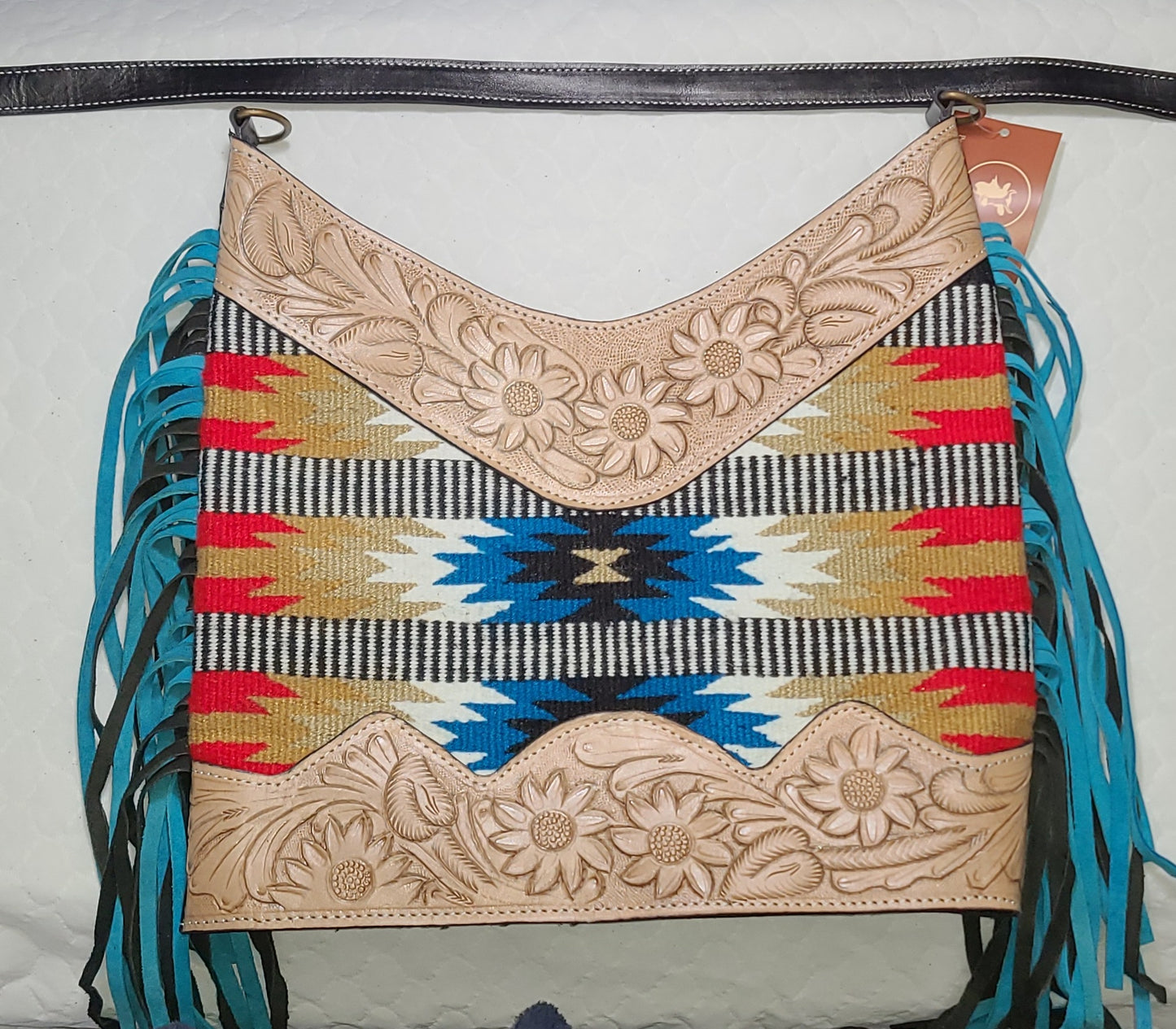 #190 CROSS BODY TOOLED LEATHER TOP AND BOTTOM/ FRONT COLORED FABRIC/ BACK LEATHER W ZIPPER