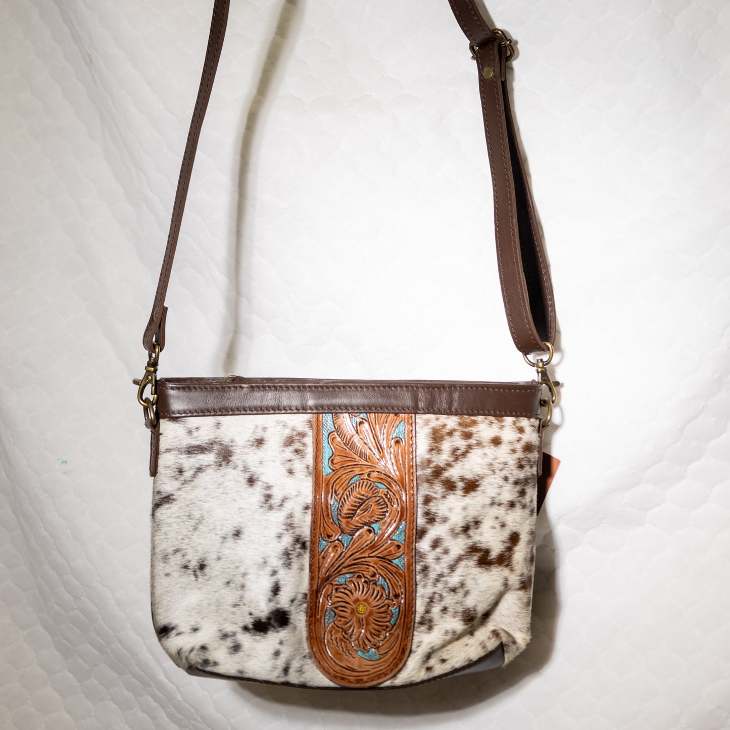 #194  CROSS BODY COWHIDE FRONT/W TOOLED TEAL STRAP/ LEATHER BACK