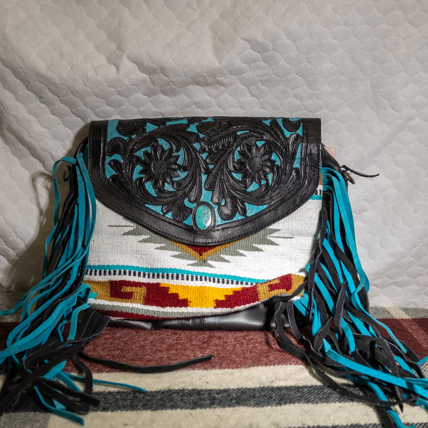 #199 CROSS BODY CLOTH PATTERN FRONT /LEATHER BACK TOOLED TEAL FLAP/ LEATHER BACK