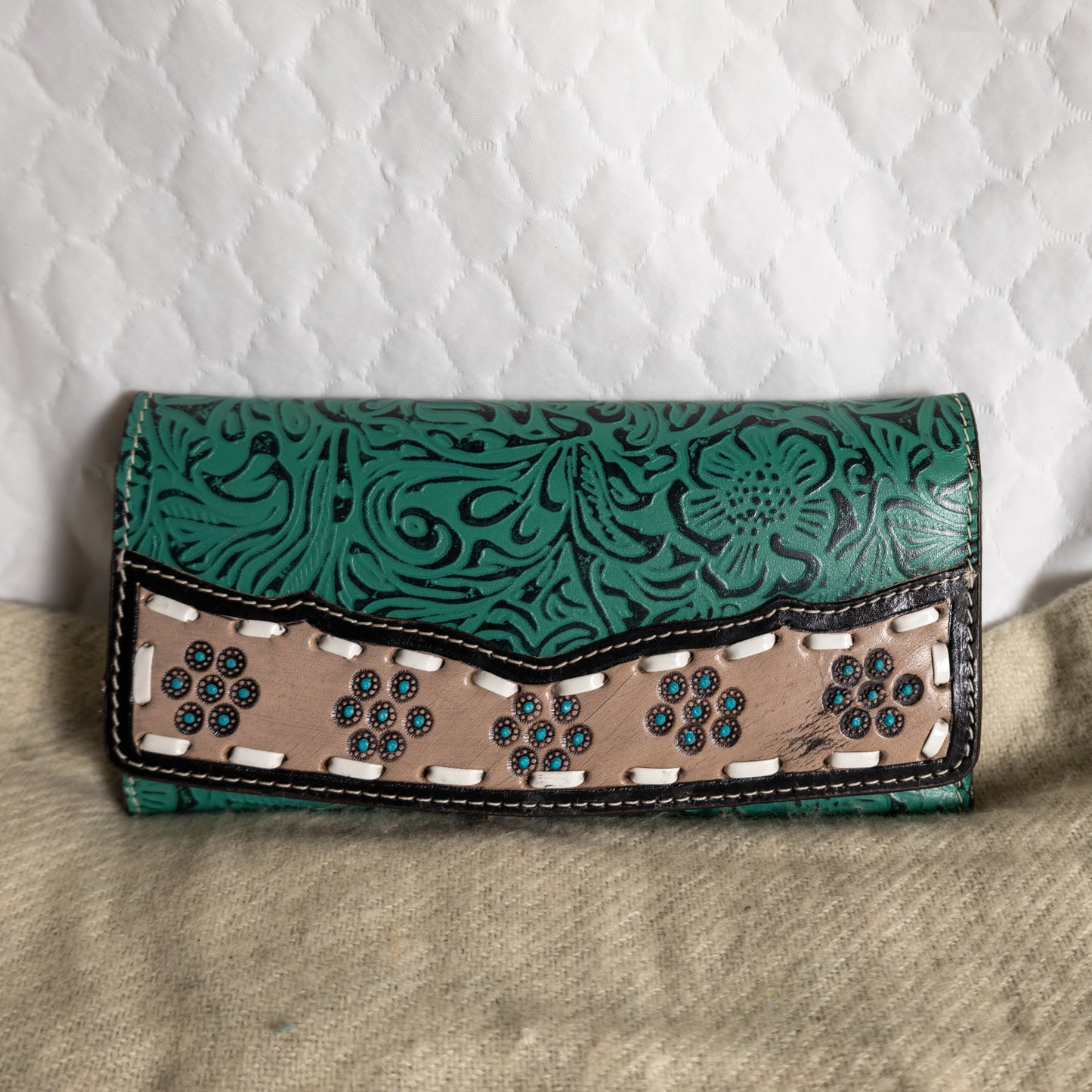 # 226 TEAL WALLET/ LACING/ FLORAL DESIGN ON FRONT