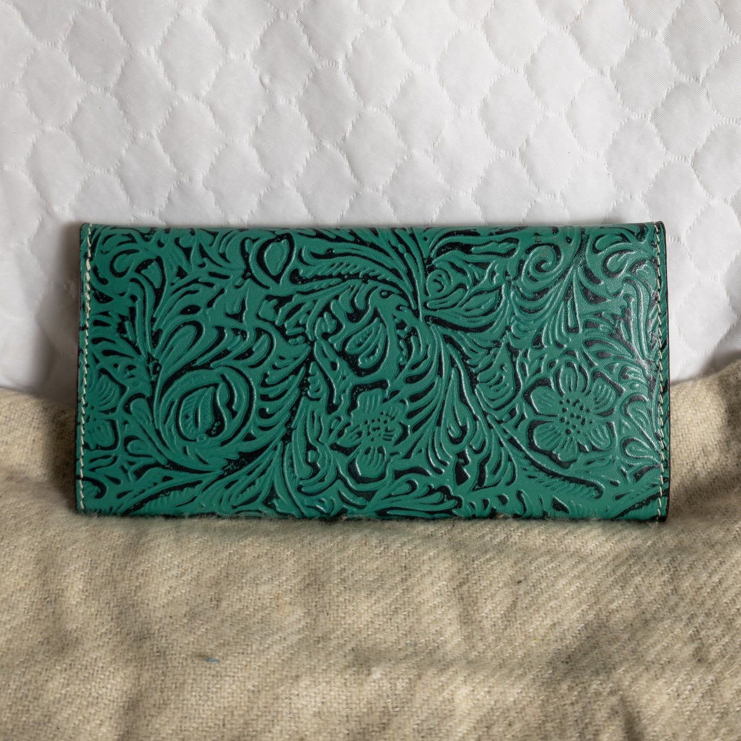 # 226 TEAL WALLET/ LACING/ FLORAL DESIGN ON FRONT