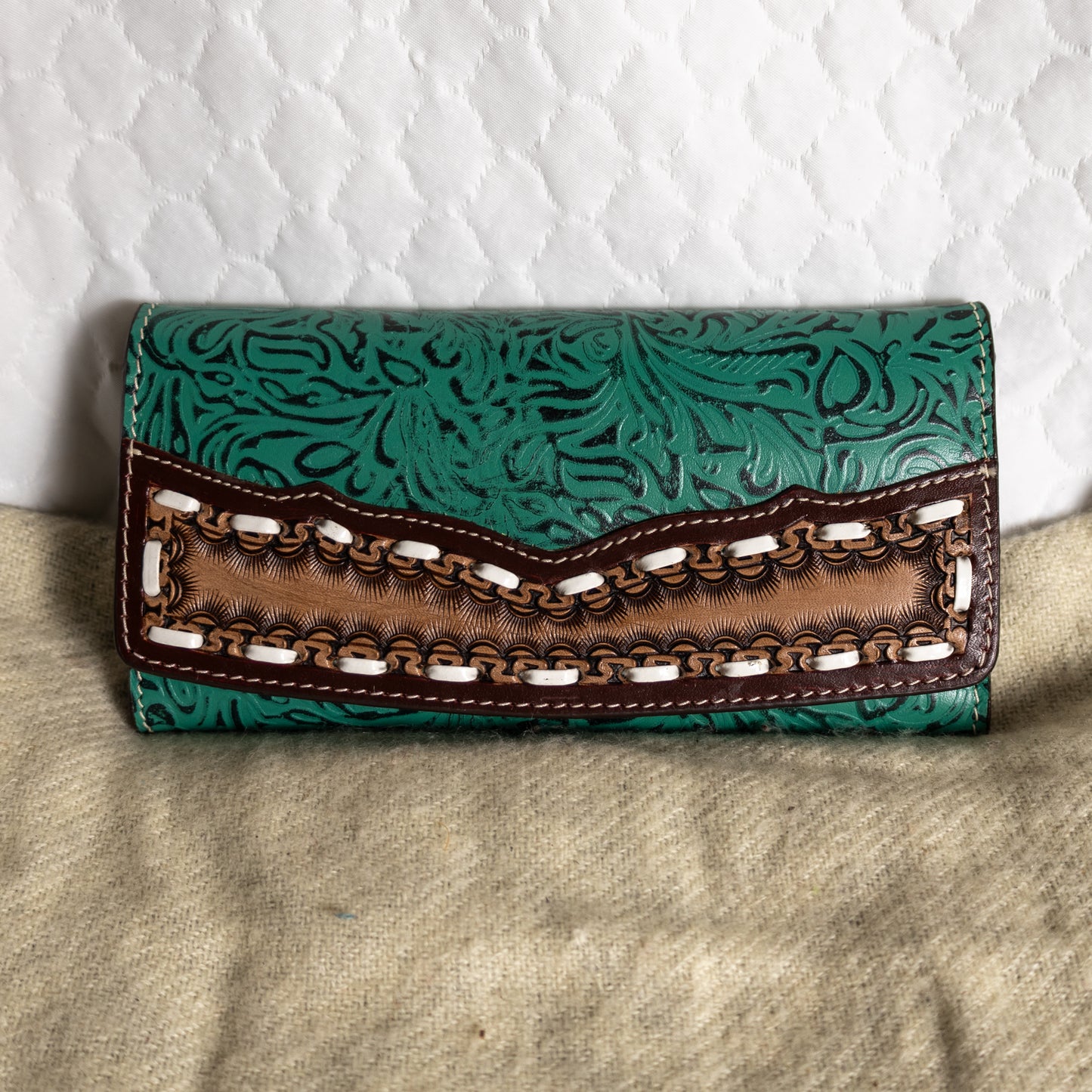 # 226 TEAL WALLET/ LACING/ FLORAL DESIGN ON FRONT