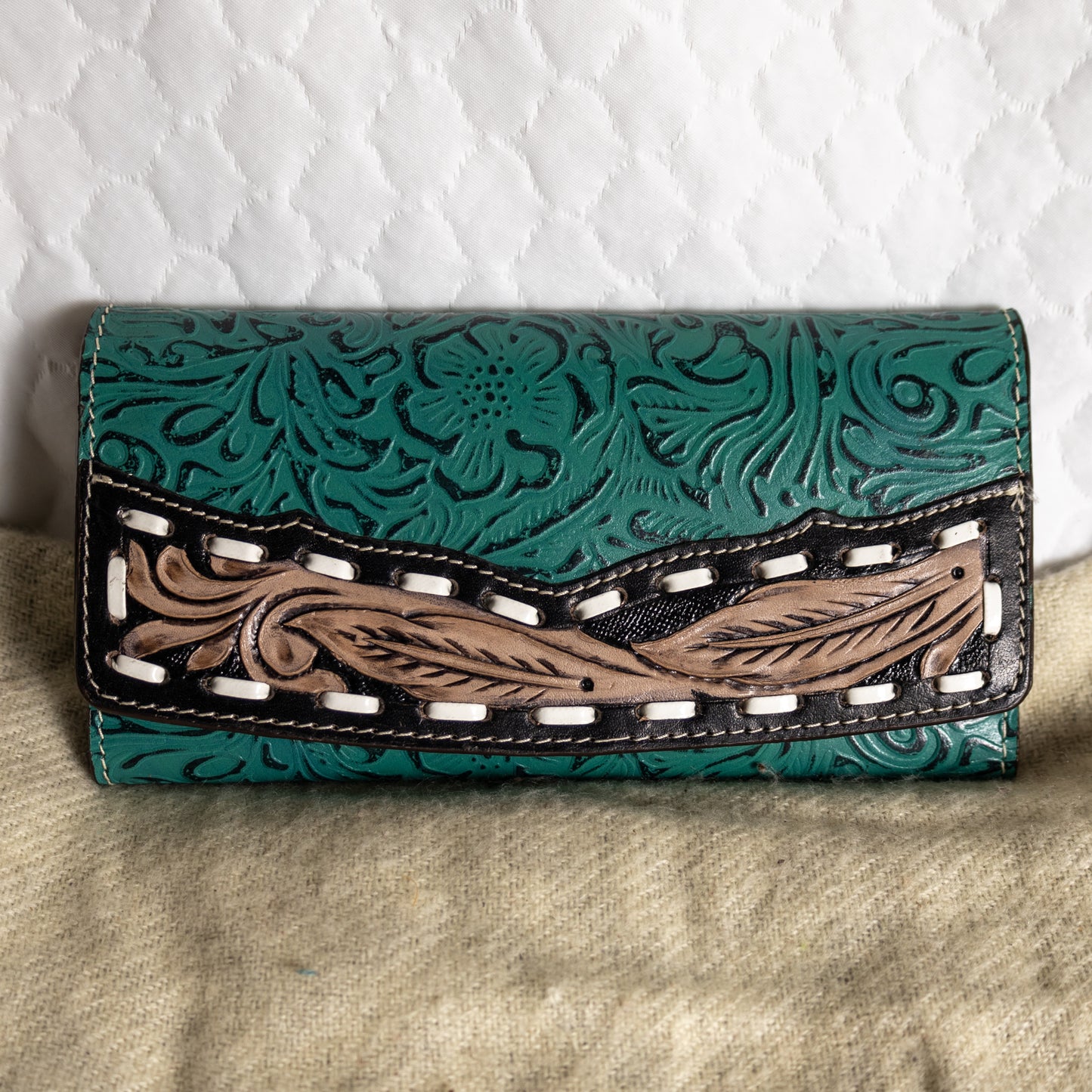 # 226 TEAL WALLET/ LACING/ FLORAL DESIGN ON FRONT