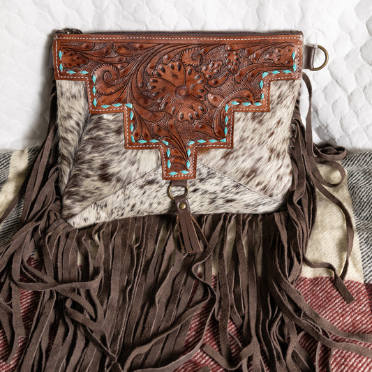 #229 CROSSBODY W/ TOOLED FLORAL PATTERN FRONT LEATHER BACK/ FRINGE AND TASSEL